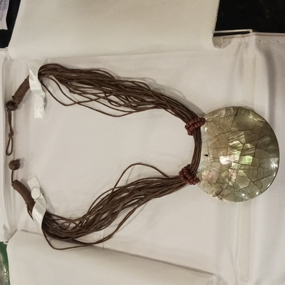 Brown rope iridescent pendent necklace.